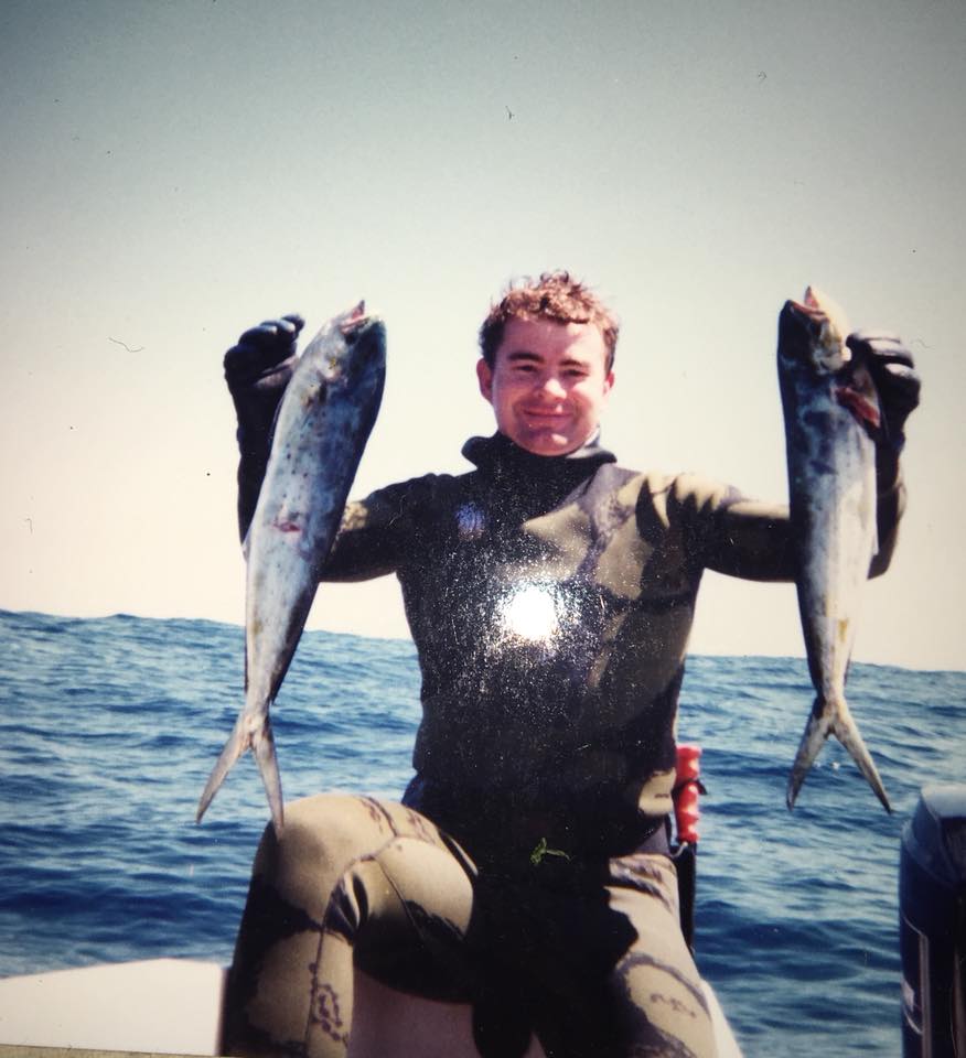 NSUC diver with catch on the water