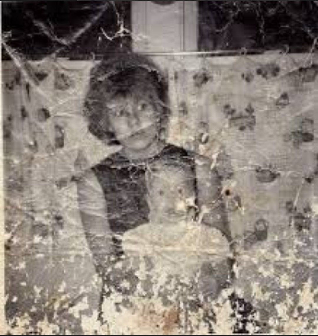 Damaged Vintage Mother and Child Photo generated image example