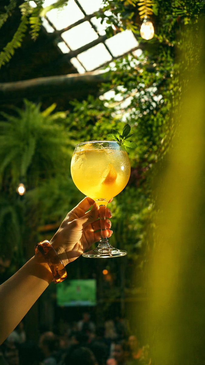 Golden Cocktail in Greenhouse Bar generated image example