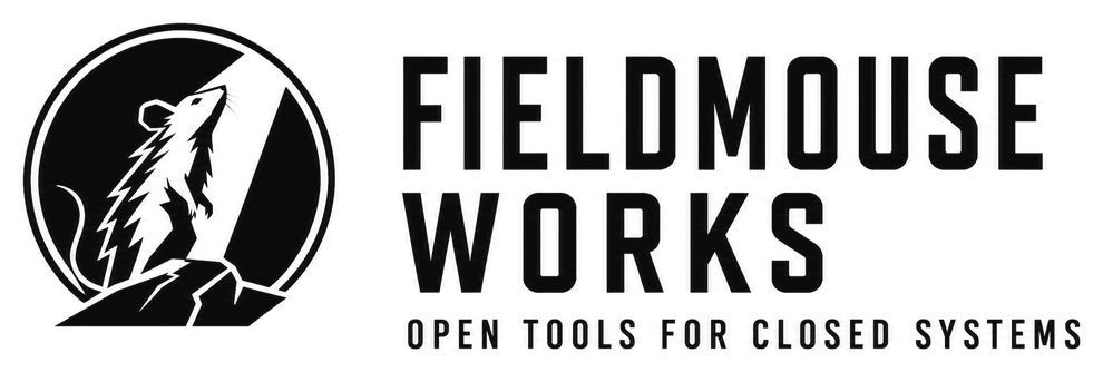 Fieldmouse Works: a field mouse on a rock looking up into a shaft of light. Open tools for closed systems.