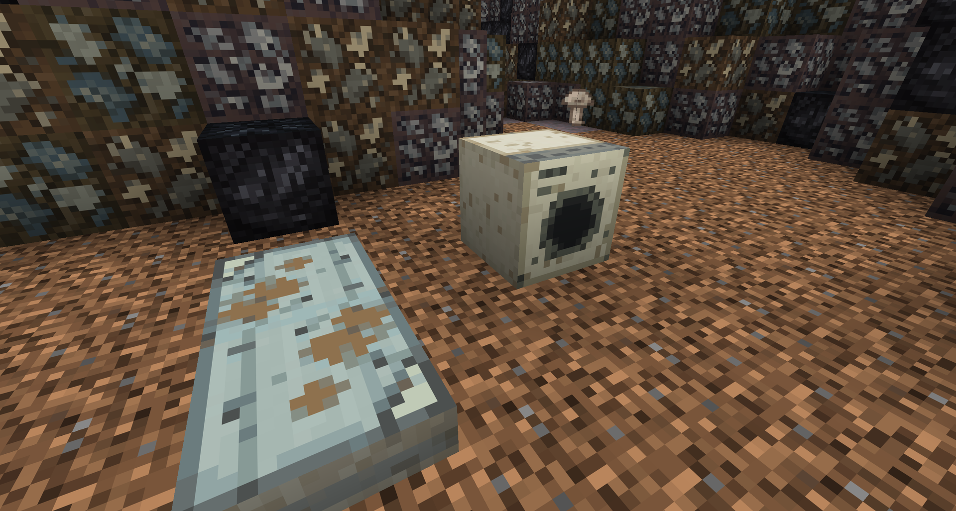 Bulky waste opened with a prybar: a washing machine, a printer, a filing cabinet.
