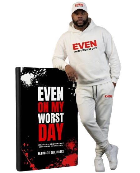 Maurice Williams with the Even On My Worst Day book and Status Plus apparel