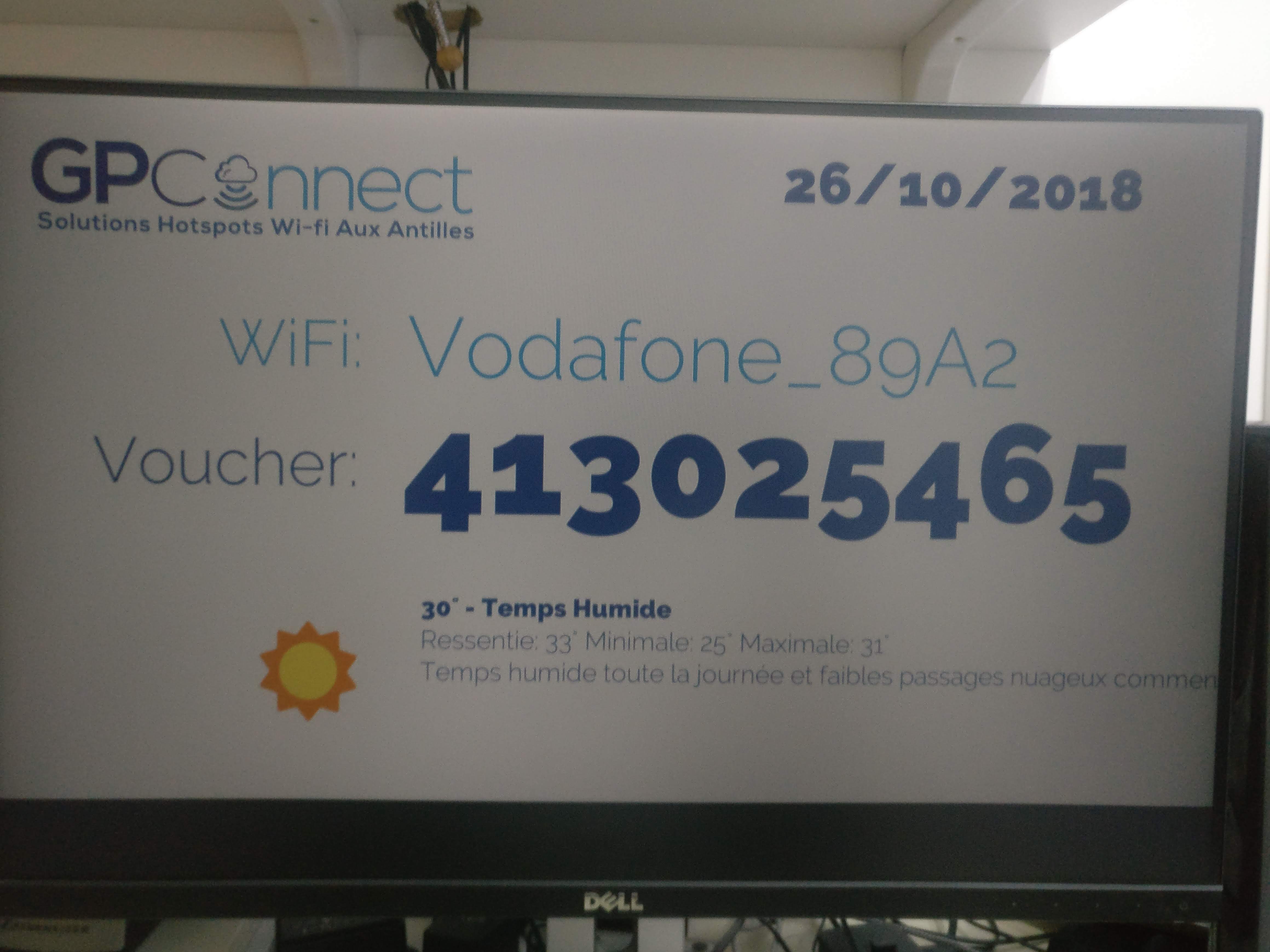 HDMI display showing voucher with sunny weather