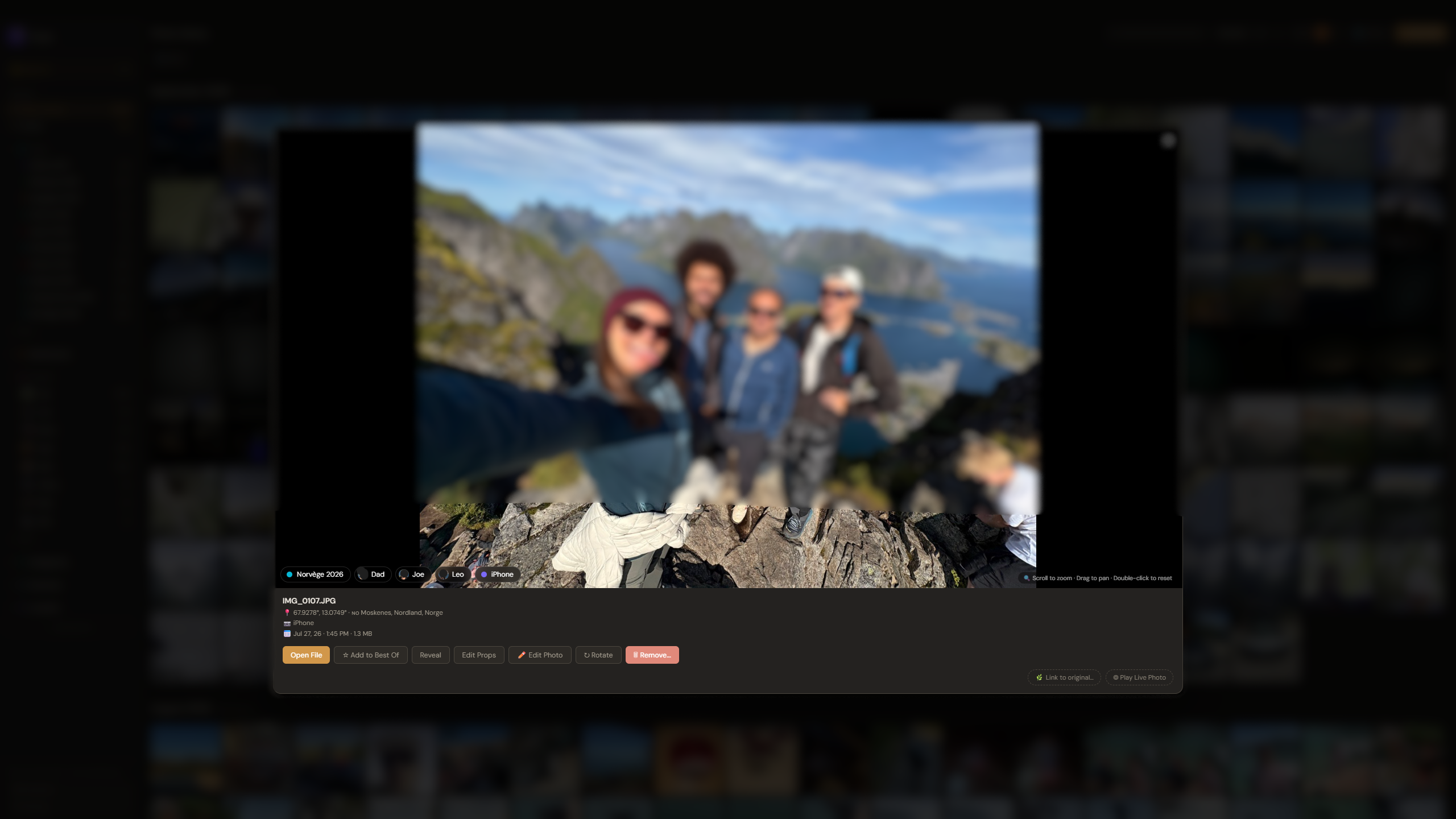 A photo open in the preview, with folder bubbles along the bottom showing the trip and each person's face