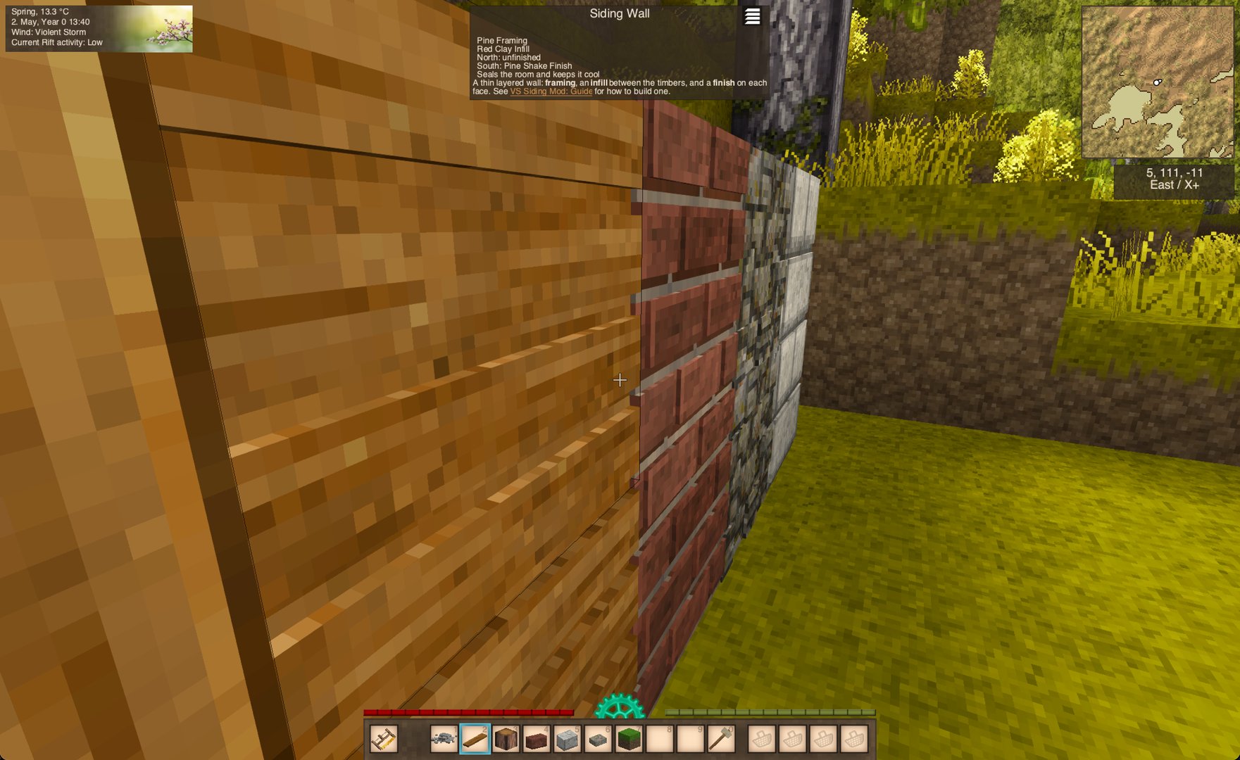 Close up of weatherboard, brick and stone finishes showing their raised relief