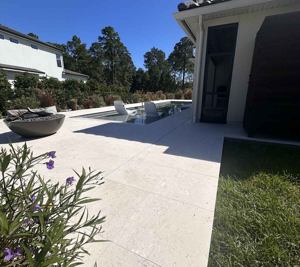 Travertine pool deck and patio sealing in Yulee FL