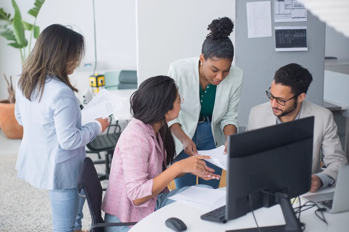 The investment team working through a note together