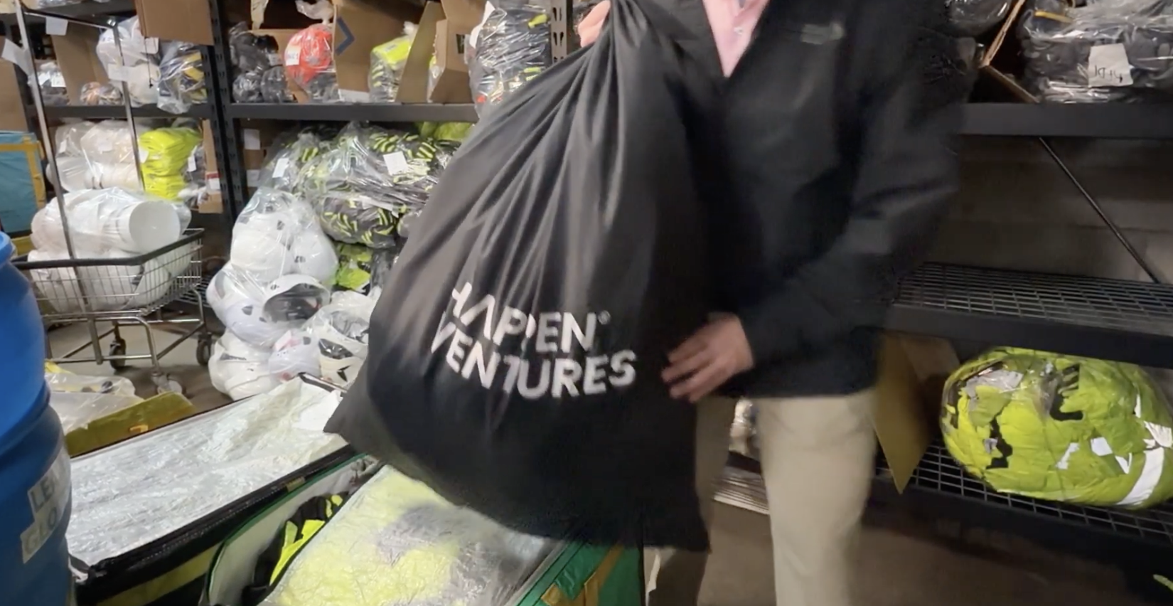 Happen Ventures team bagging reclaimed PPE in the warehouse