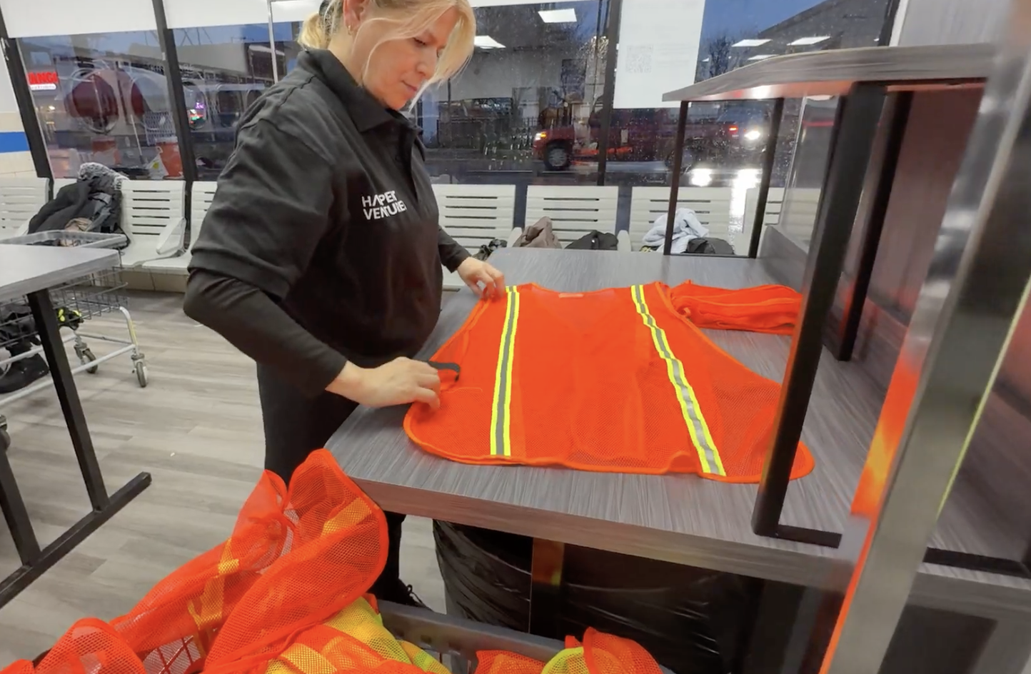 PPE vest inspection and signage display
