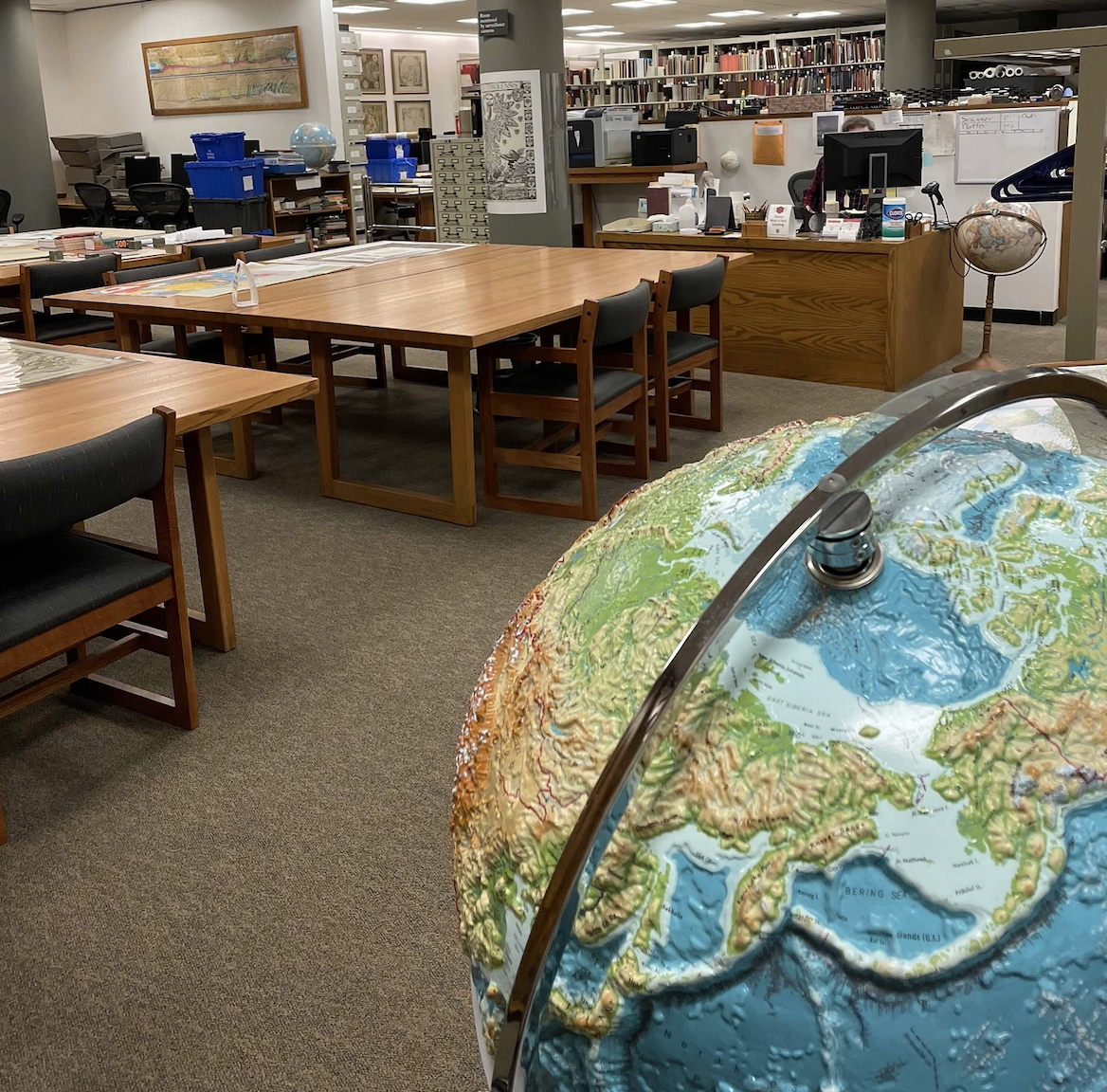 Photograph of the Map Collection with picture of a globe and big tables