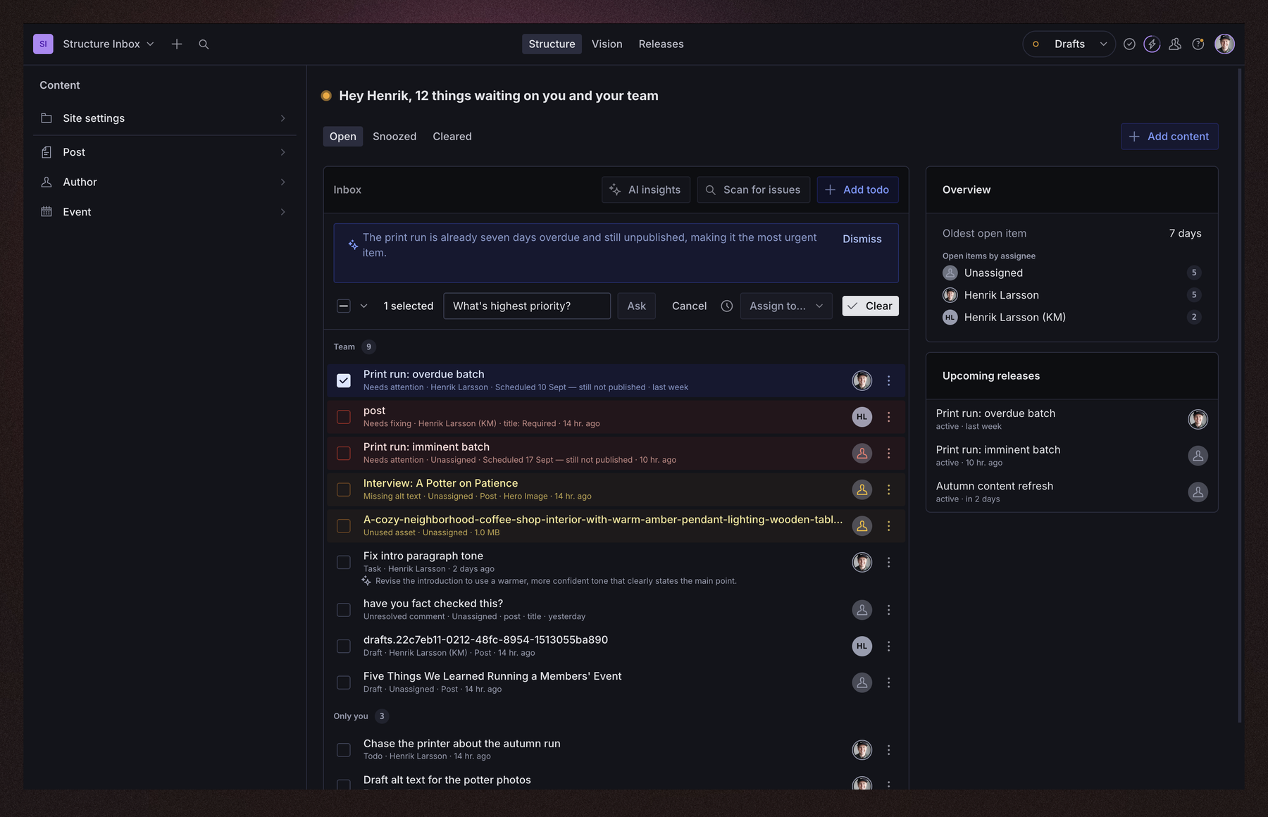 One row selected, with the action bar showing Ask, Snooze, Assign to… and Clear, and an AI answer above the list