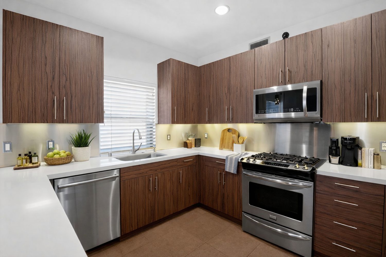 Updated open kitchen with wood cabinetry at 11023 Fruitland Drive #401