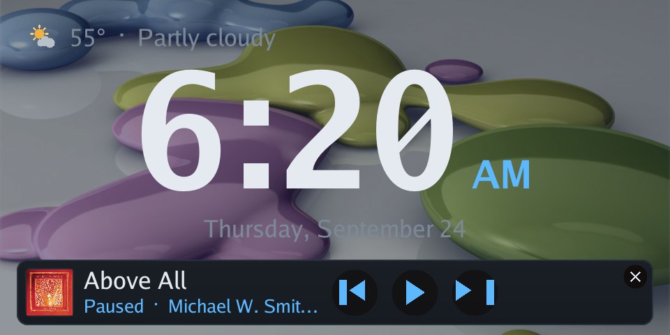 The mini player strip over the clock