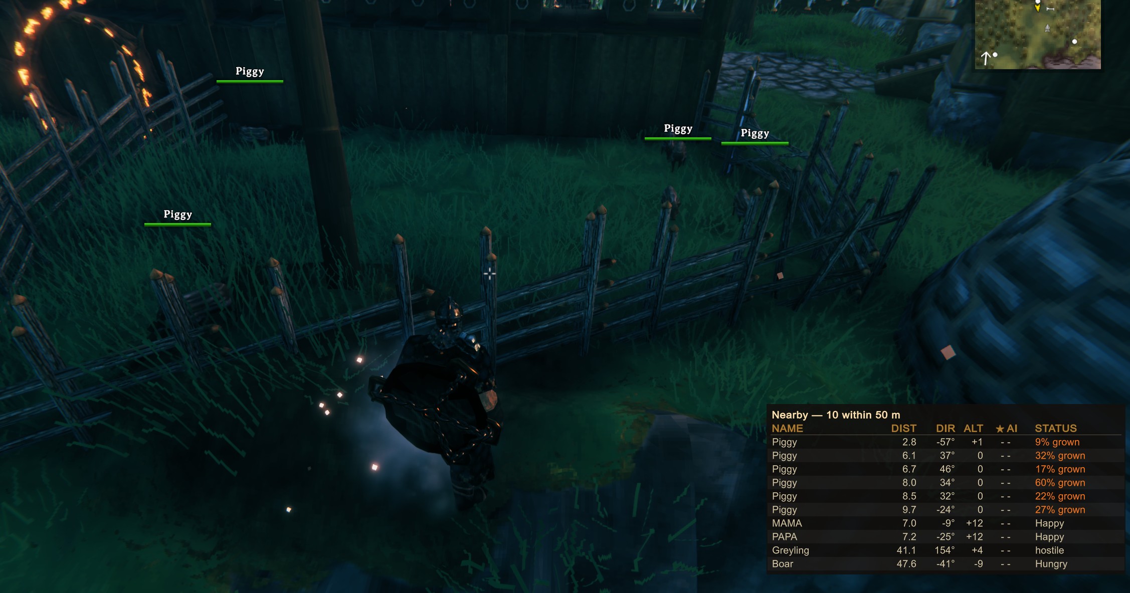 A boar pen at night: piglets growing, the parents, and a greyling further out