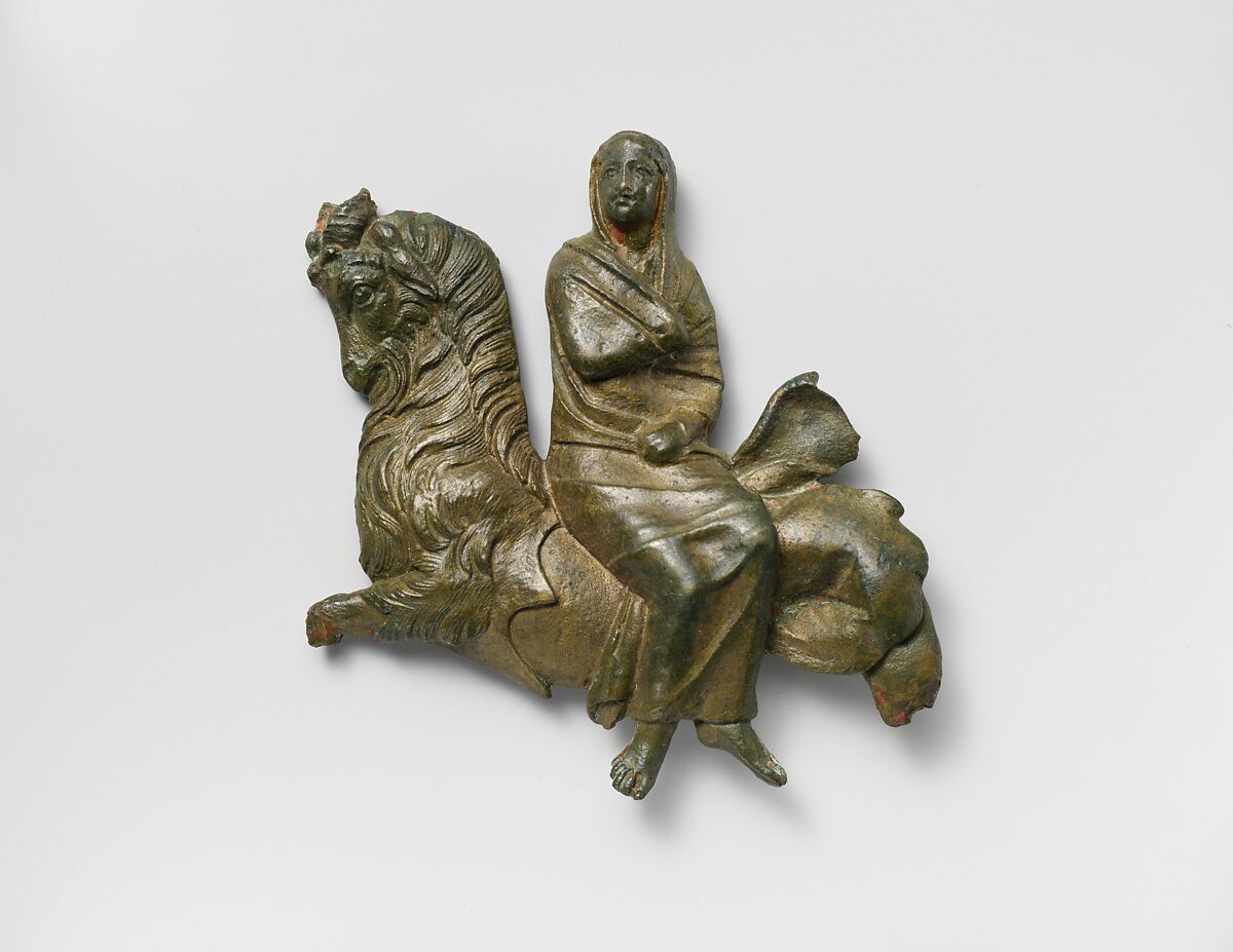 A VEILED WOMAN RIDING A SEA-GOAT