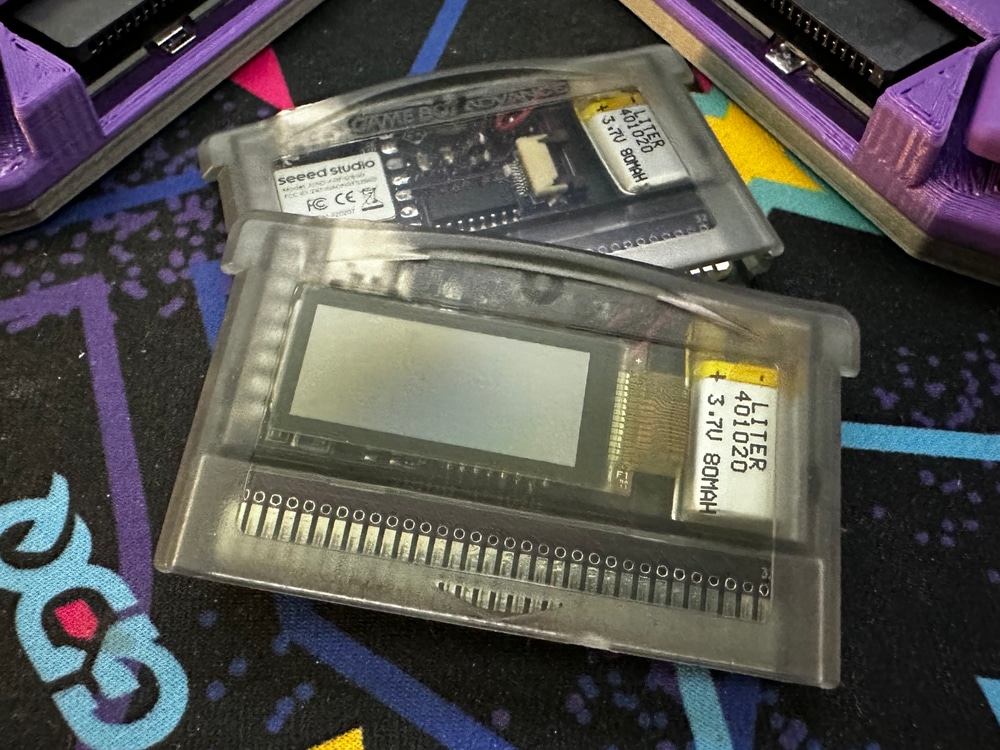 The TypePak, a microcontroller and black and white display inside of a Game Boy Advance cartridge.