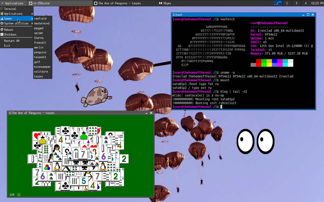 Gloire running the JWM window manager, a terminal emulator, xeyes, and a game