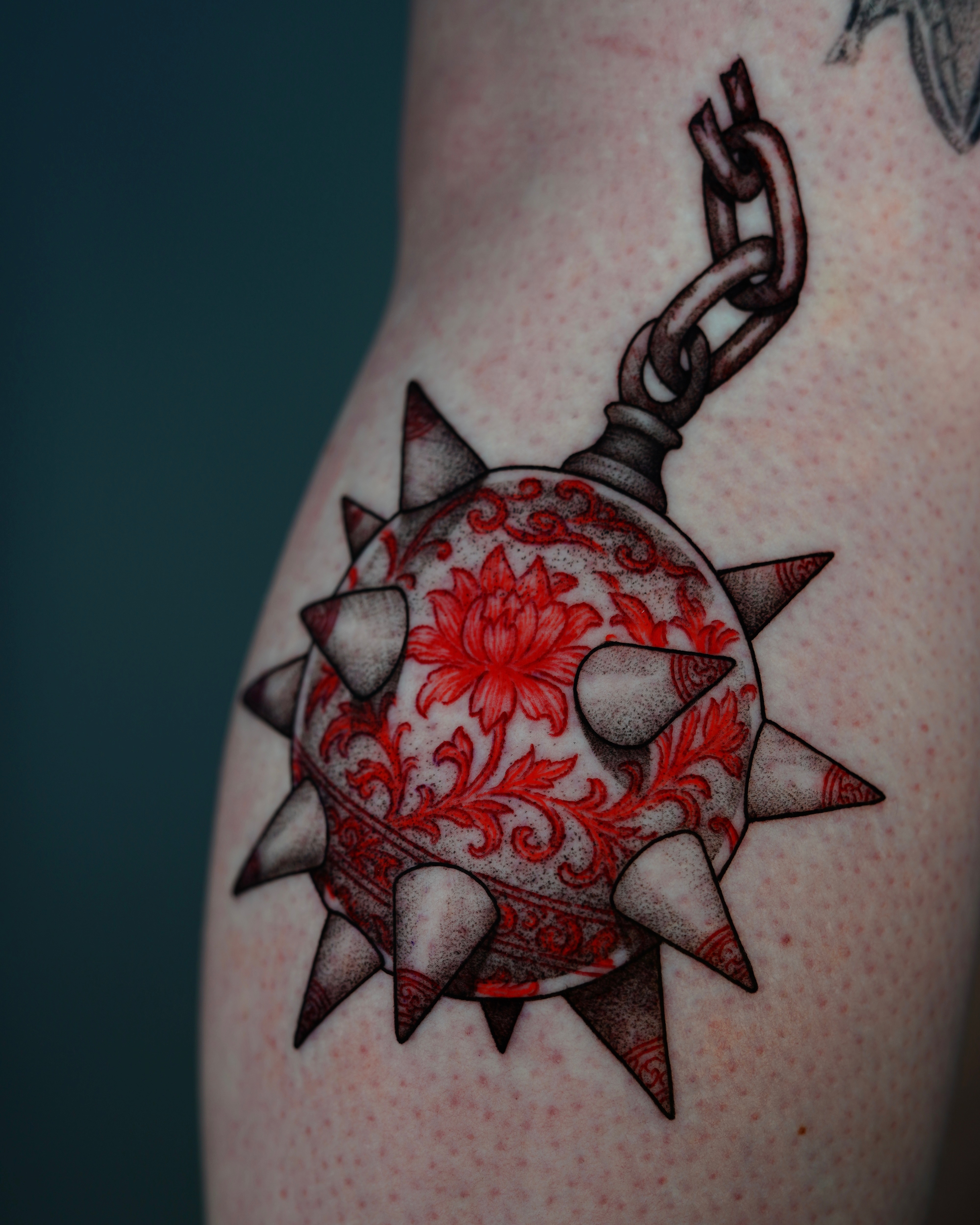 Red And Black Tattoo By Tony