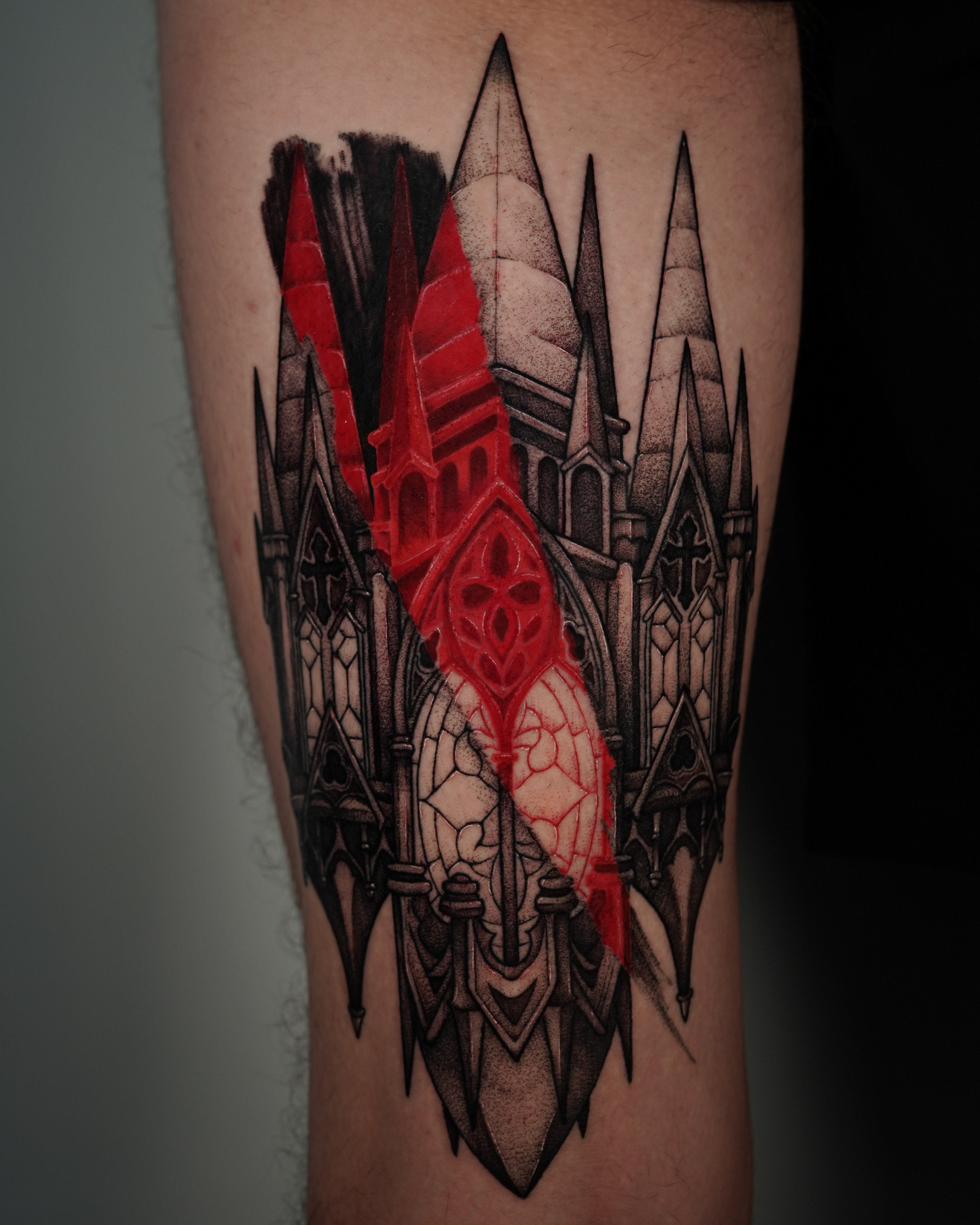 Red And Black Tattoo By Tony