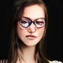 a girl with thick glasses - before