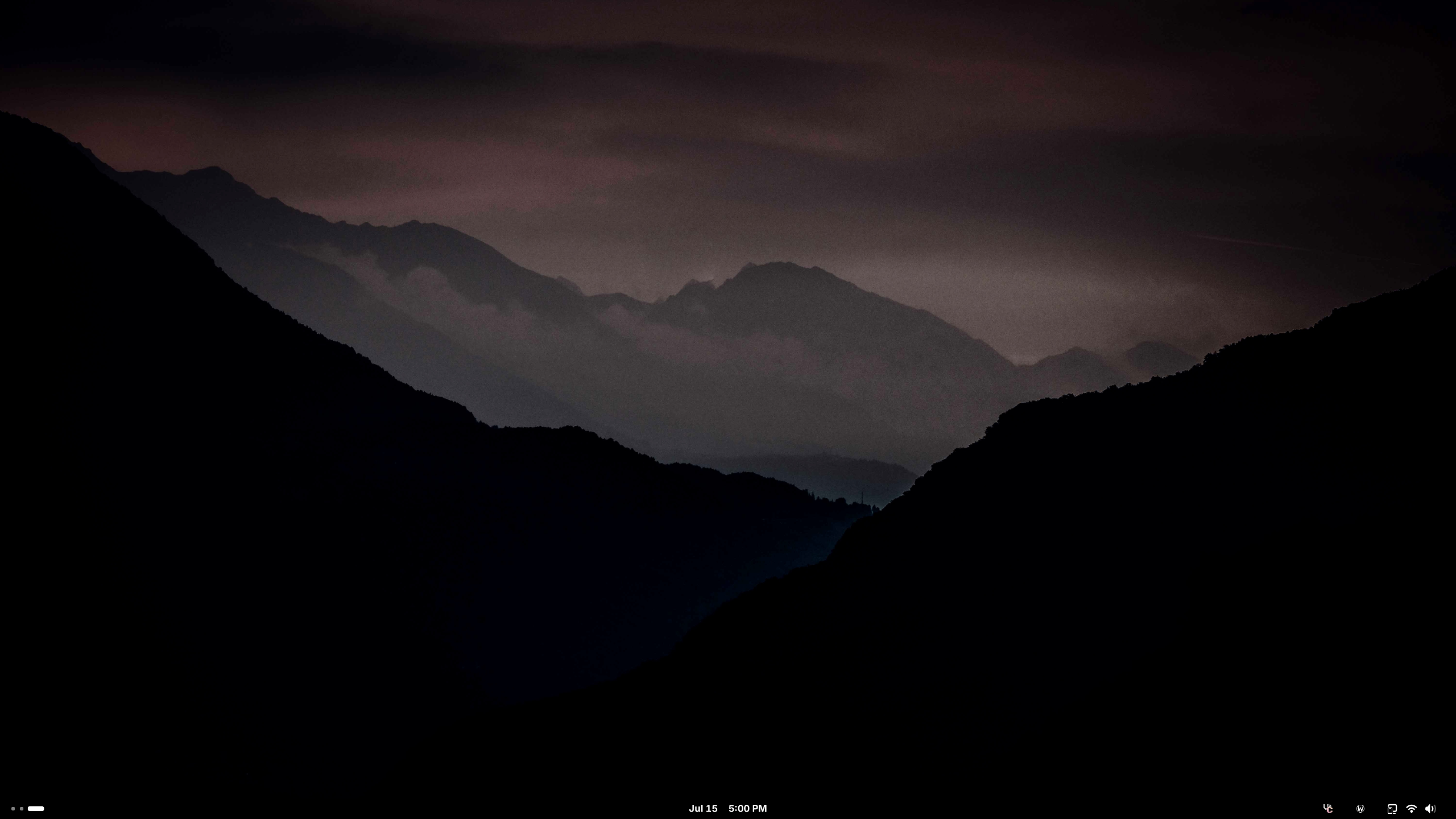 Fullscreen screenshot of a GNOME desktop. Wallpaper is Unsplash photo "silhouette of mountains during daytime" modified to make the foreground mountain pure black. JPEG artifacts are visible. GNOME's topbar has been moved to the bottom, made slightly smaller, font changed to Inter, and has the power icon removed with an X11 icon added to the right.