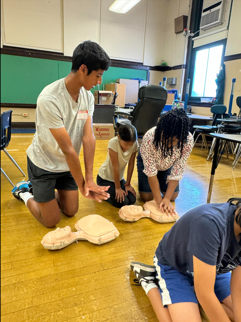 Jay Manadan demonstrating hands-only CPR