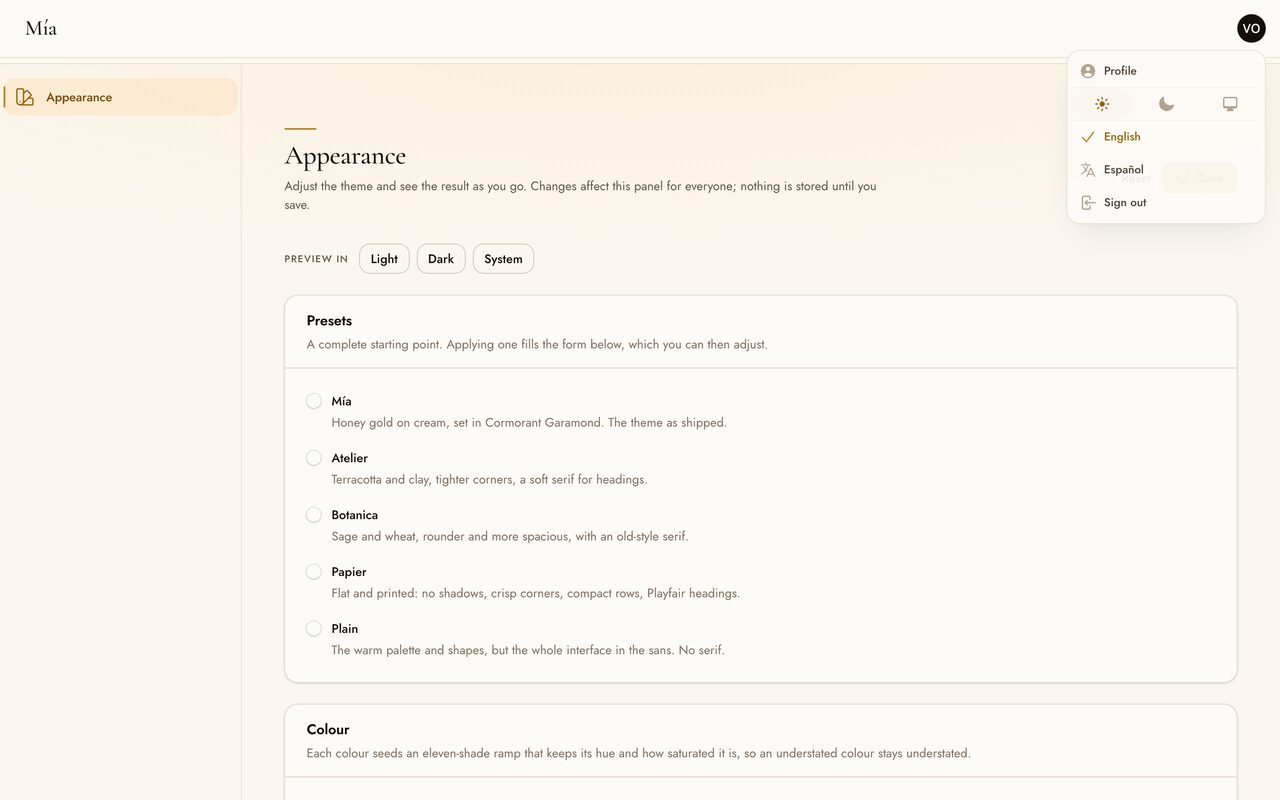The user menu open, showing the light/dark switch above English and Español, with English marked as current