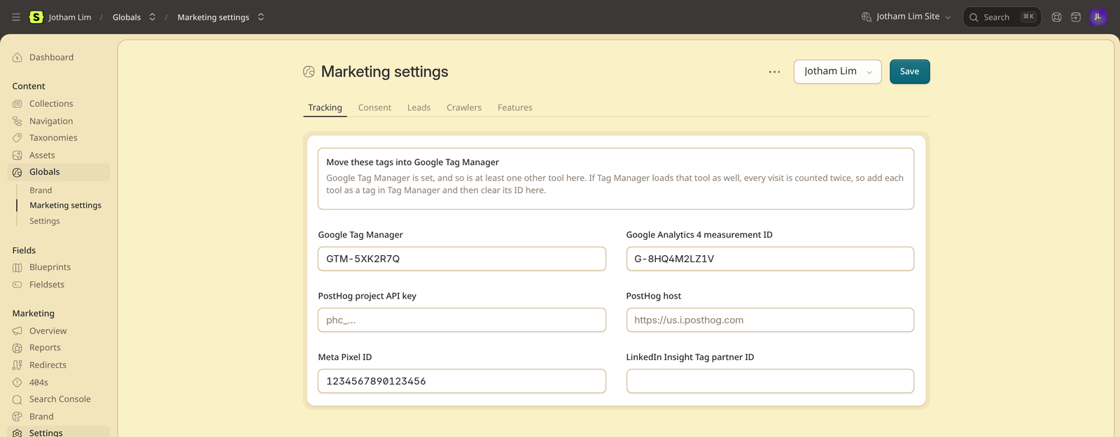 The Tracking tab of the Marketing settings, warning that Tag Manager and Google Analytics are both set