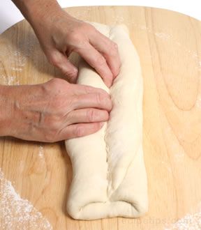 Folding the dough in thirds like a letter