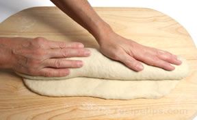 Rolling the dough into a cylinder