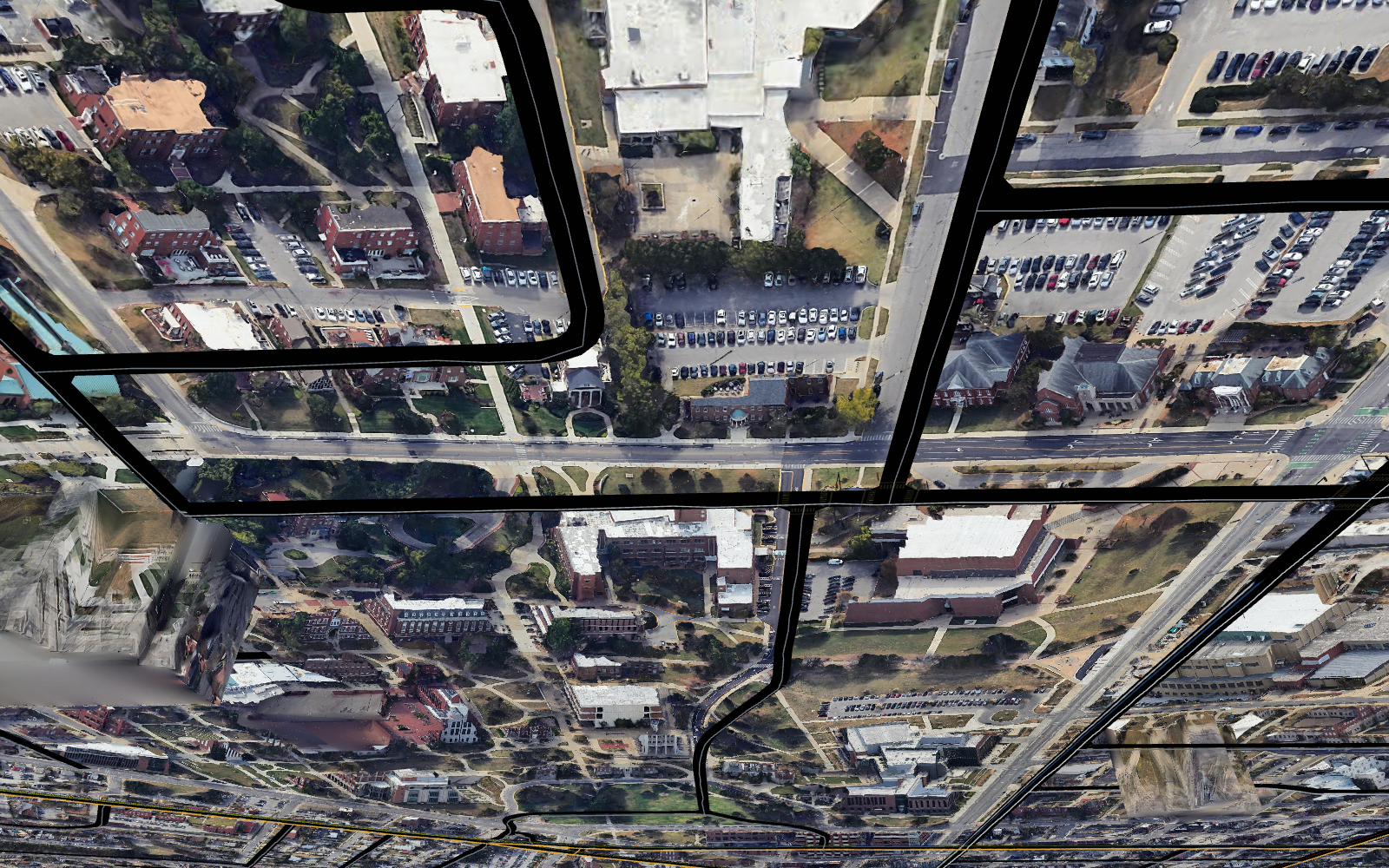 Roads and overlays draped on the photorealistic terrain