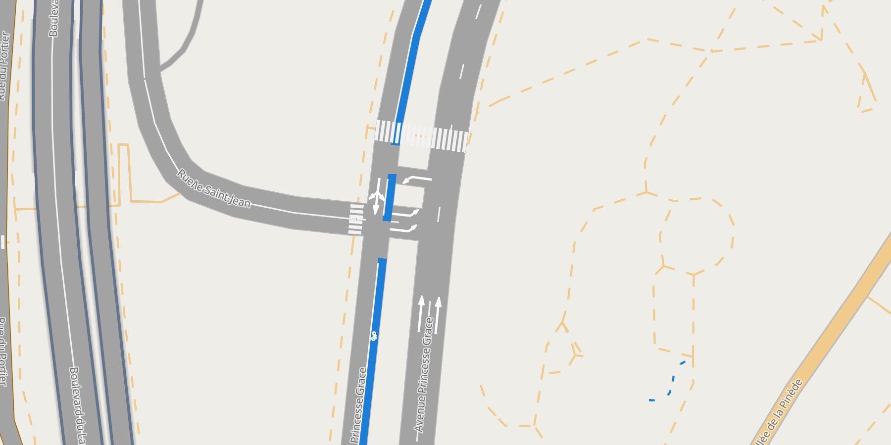 A lanestyle map of Monaco: Boulevard des Moulins with its bus lane in blue, dashed dividers, turn labels on every lane and a roundabout