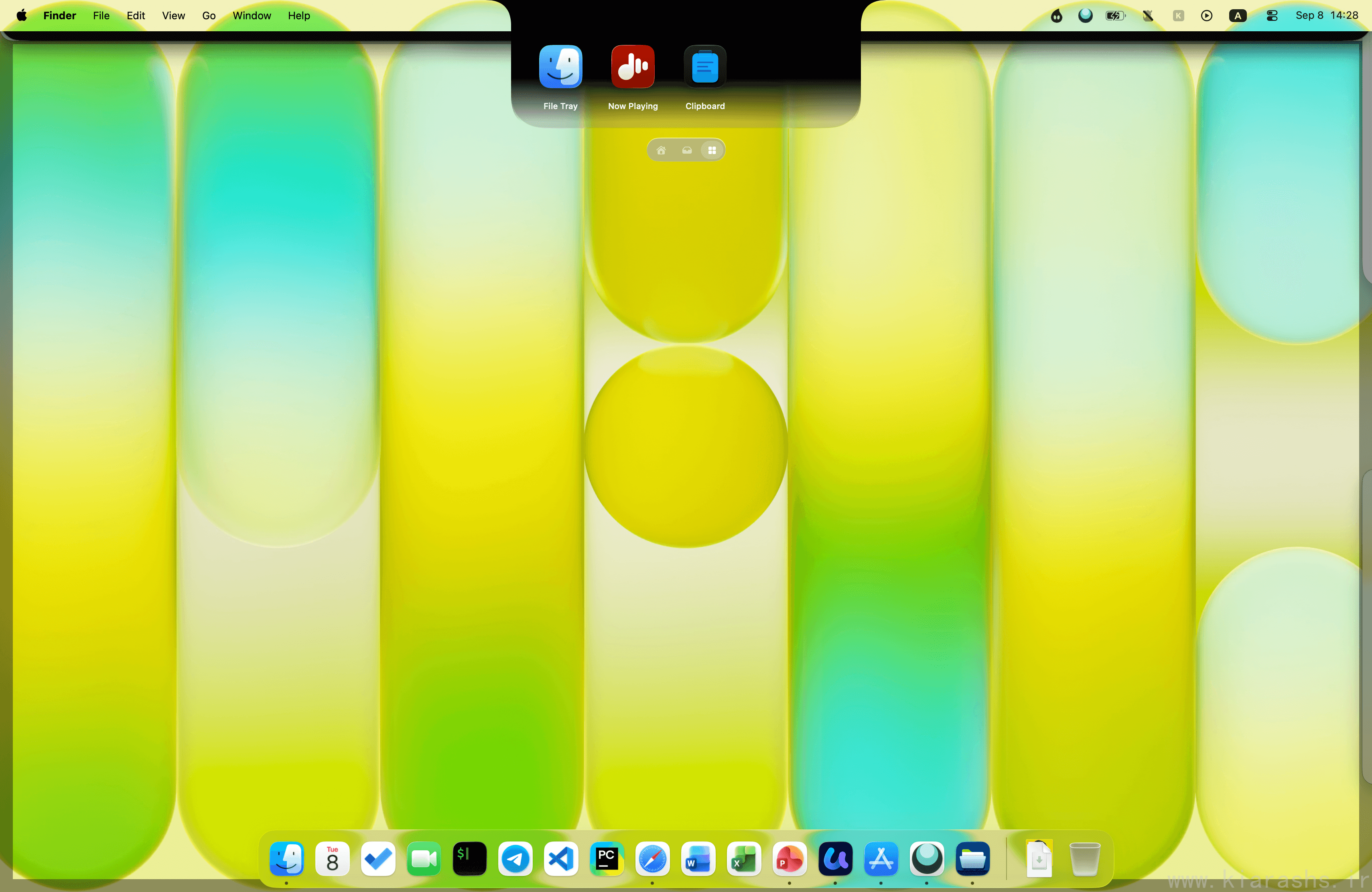 Droppy's shelf pulled down from the notch, showing the tray, clipboard and media widgets