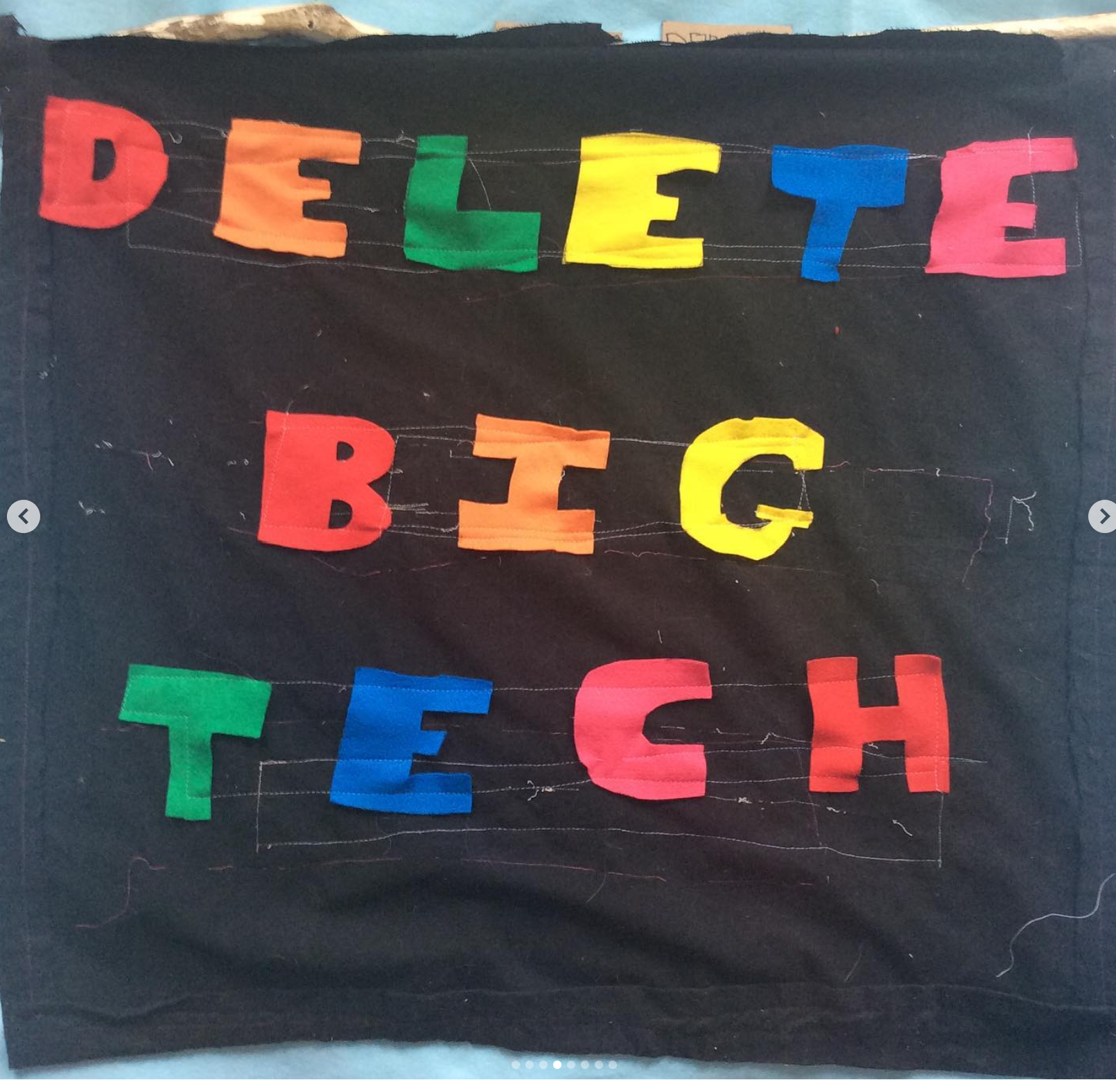 delete big tech flag with square letters 