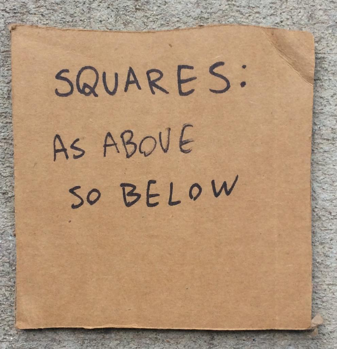 image of cardboard square which reads "as above, so below"