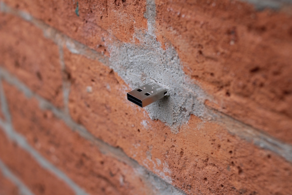 A Dead Drop embedded into a brick wall