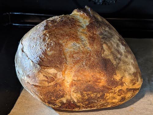 another round loaf in the oven