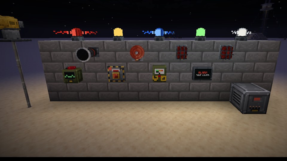A wall of alarm devices at night with rotating beacons on top