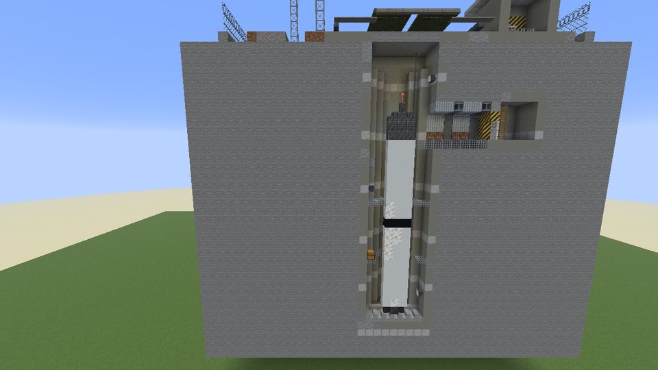 A cut-away view of an abandoned silo with its missile in the shaft