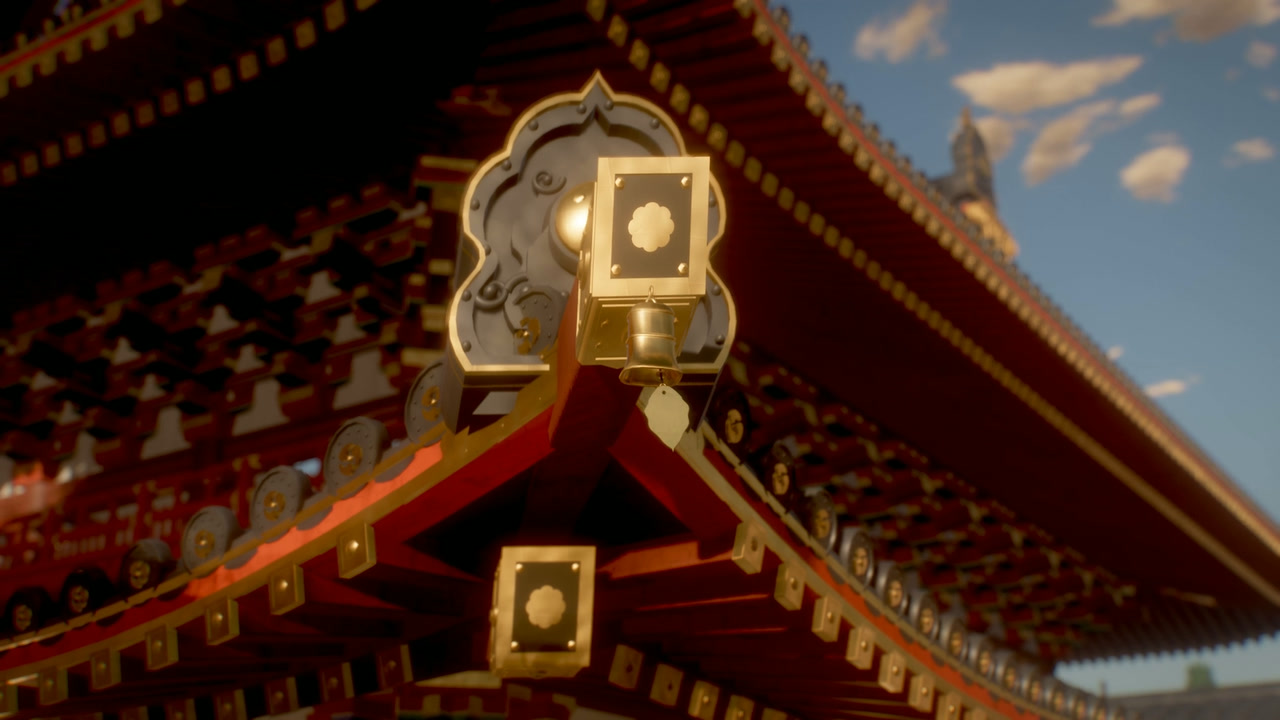 Gilt rafter cap and bell at the corner of the main hall roof