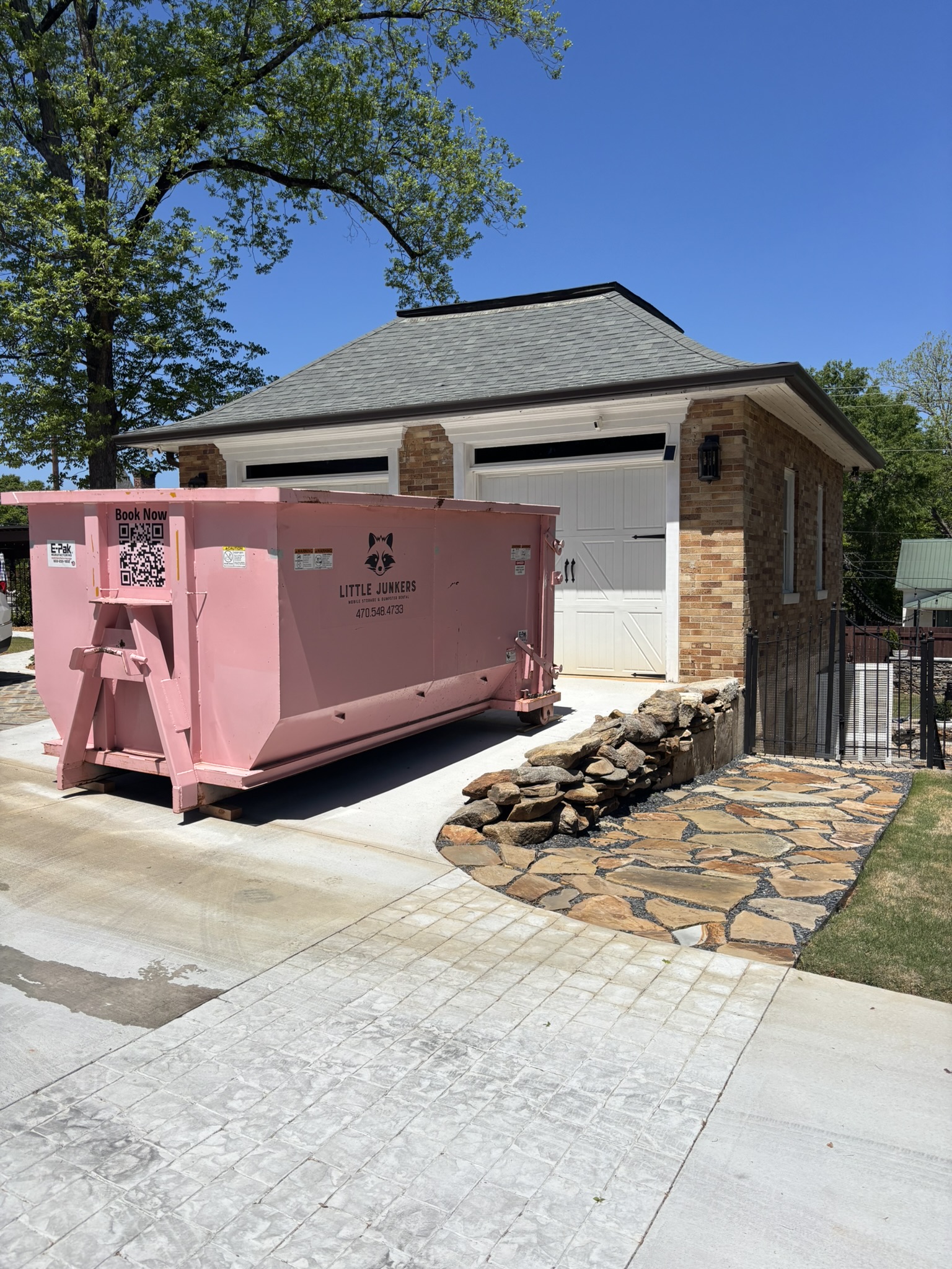 16 Yard Dumpster Rental Newnan GA - The Mighty Middler near garage