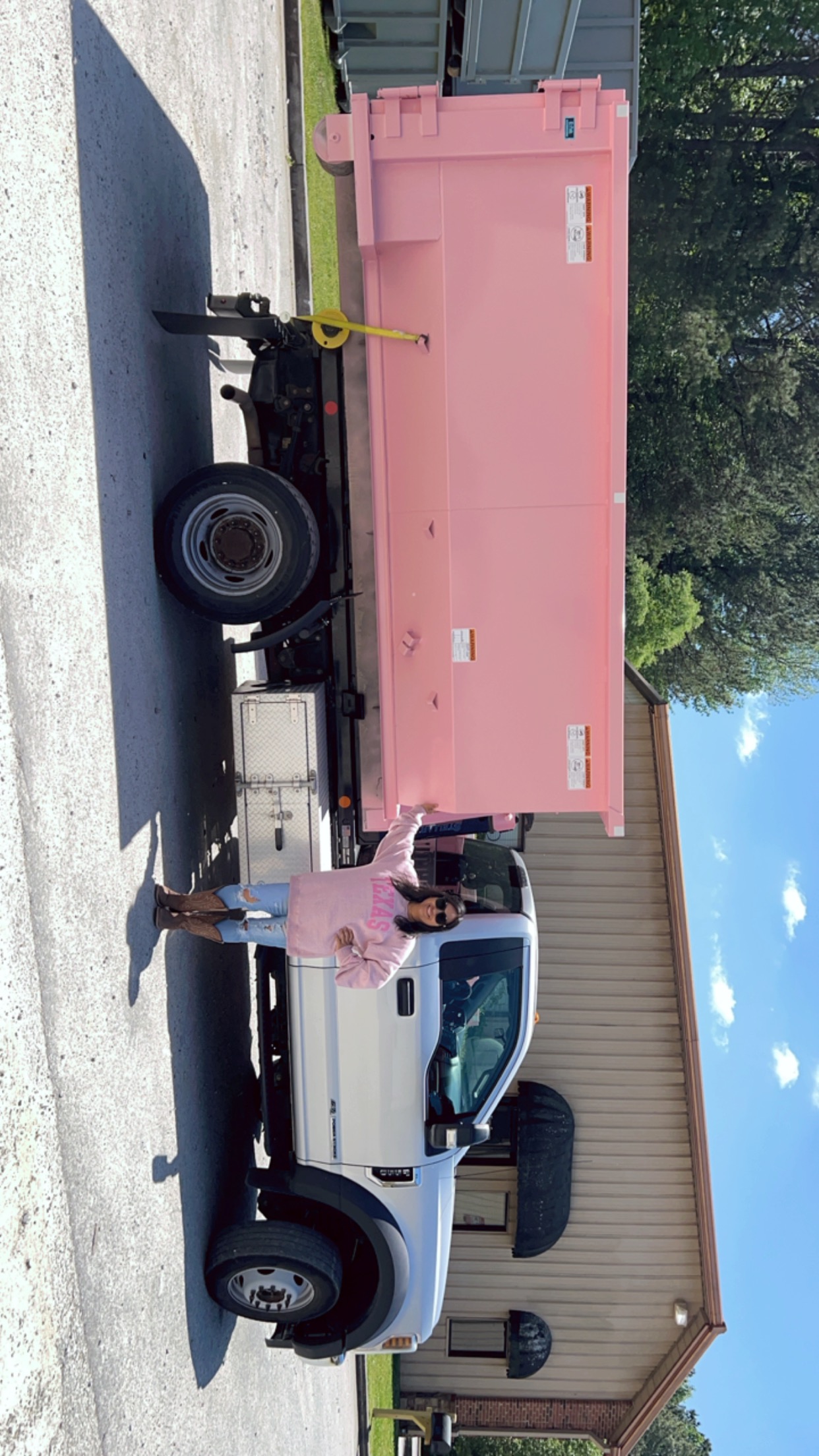Ivy Griffin with a pink Little Junkers dumpster and truck