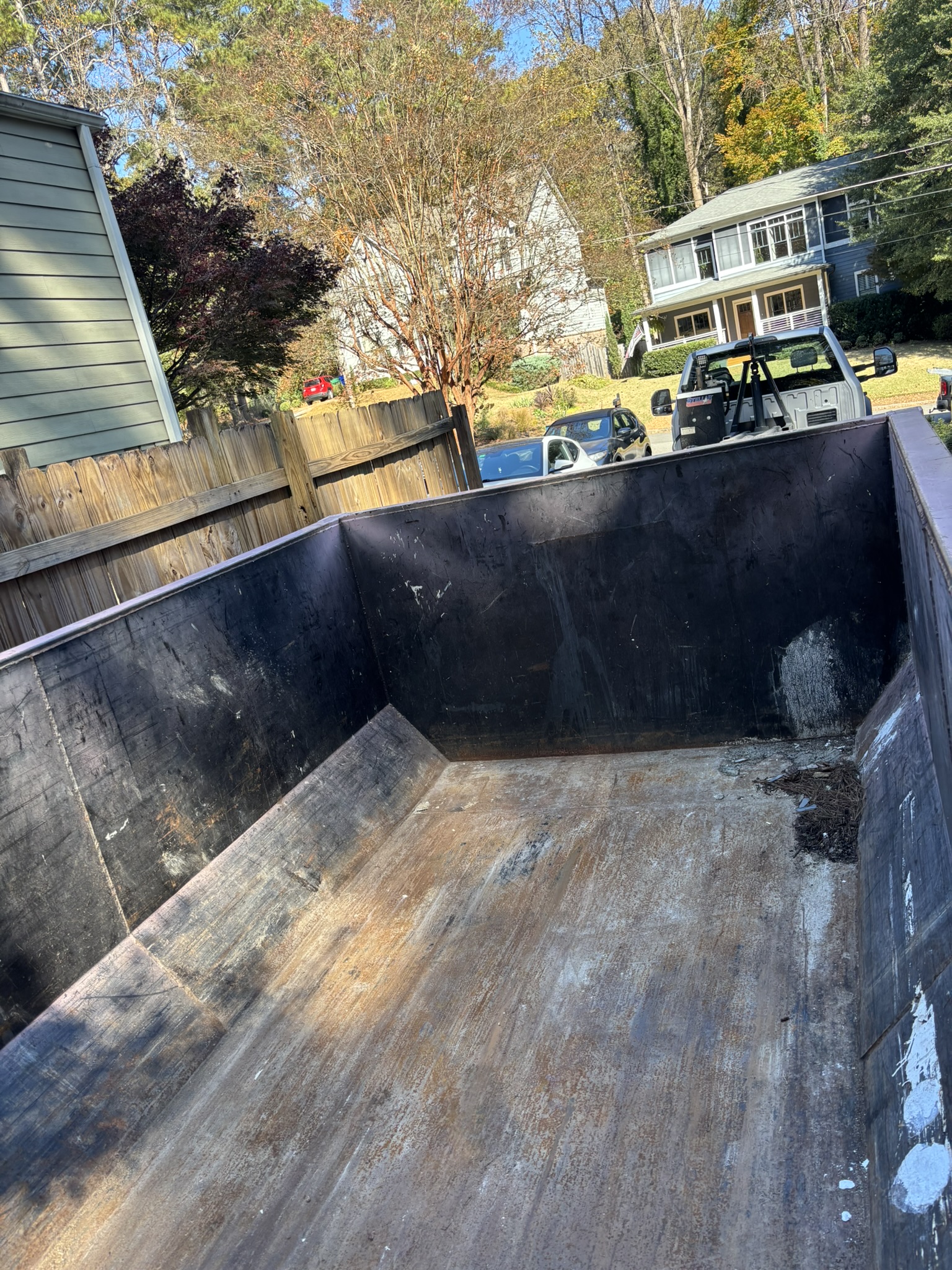Interior view of empty 11-yard roll off dumpster
