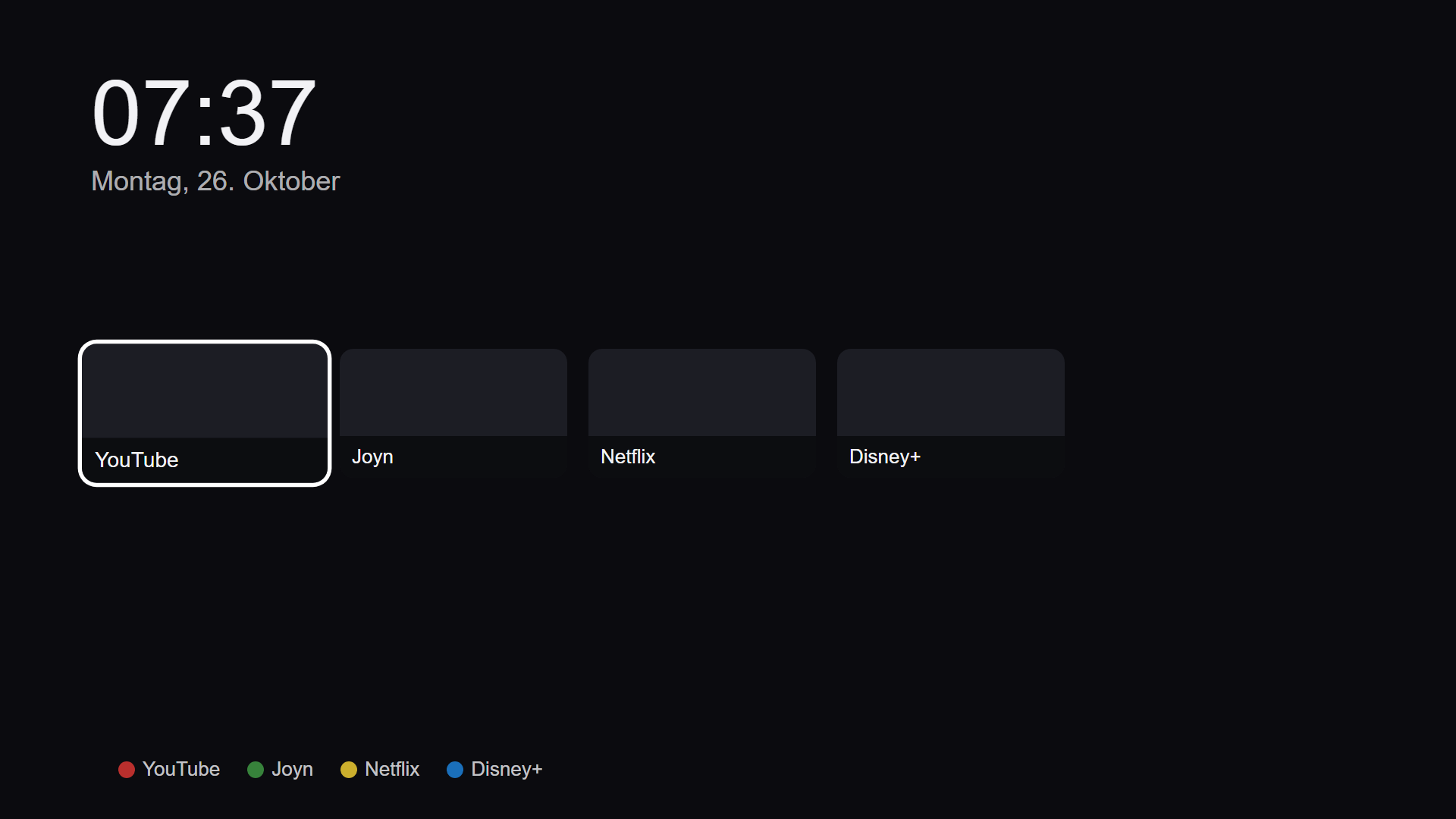 HomeShelf start screen with a clock, date, four app tiles and the colour-key legend