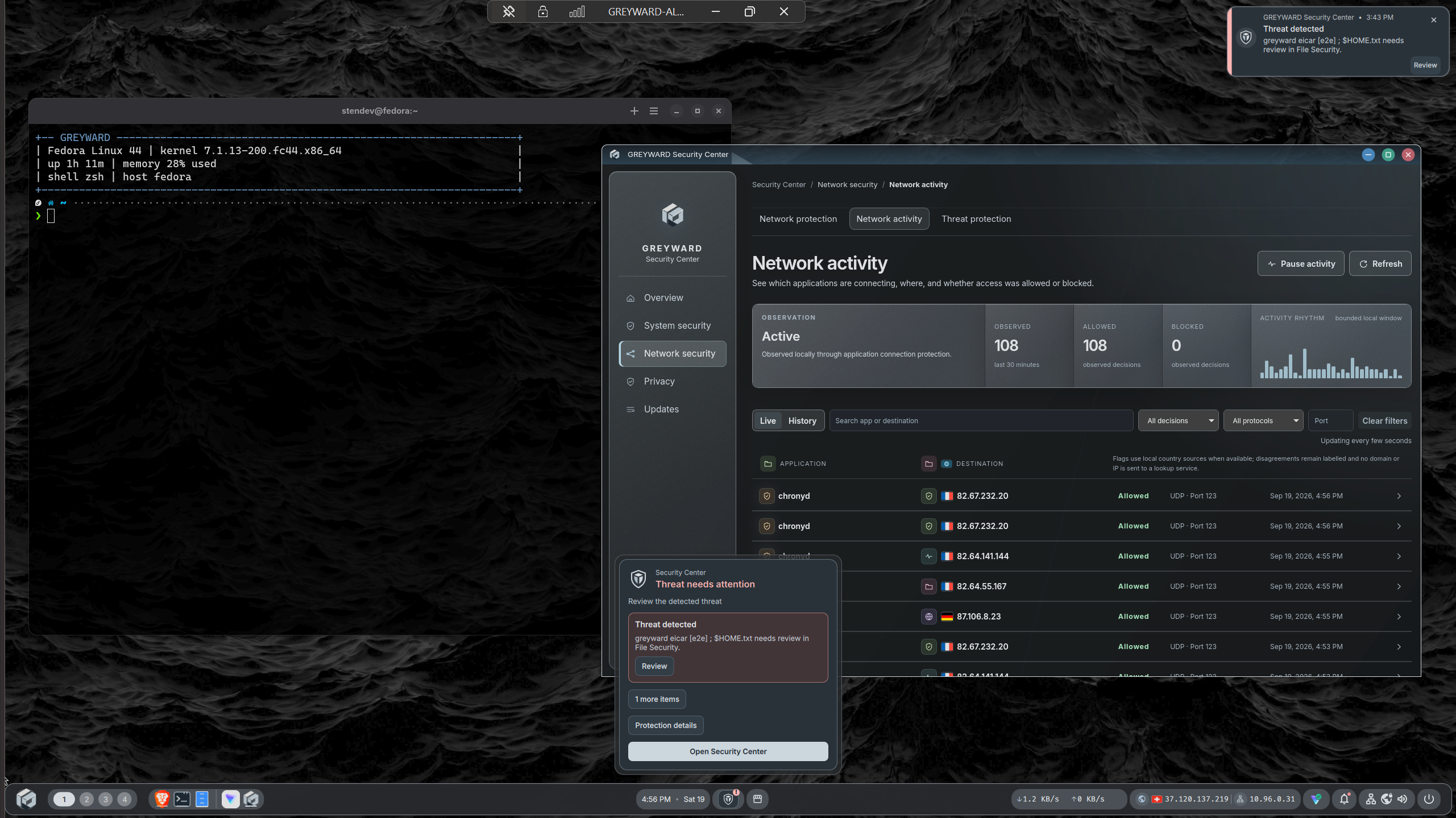 GREYWARD desktop with Security Center, terminal, and security notifications