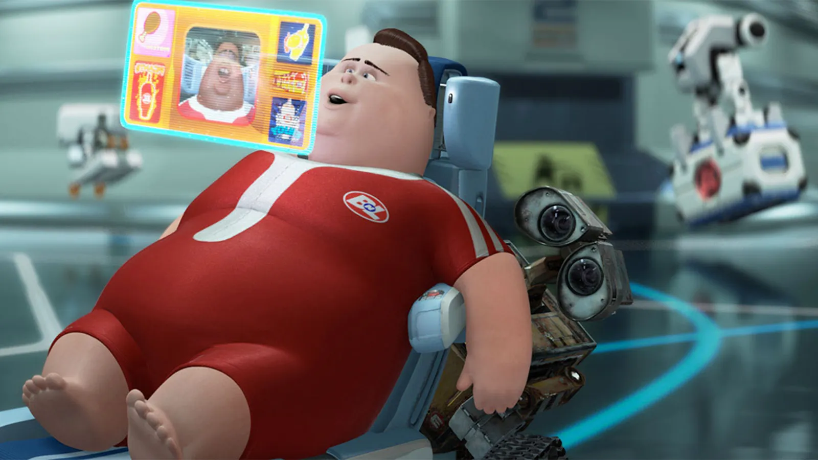 A human reclining in a hover chair while Wall-E does the work