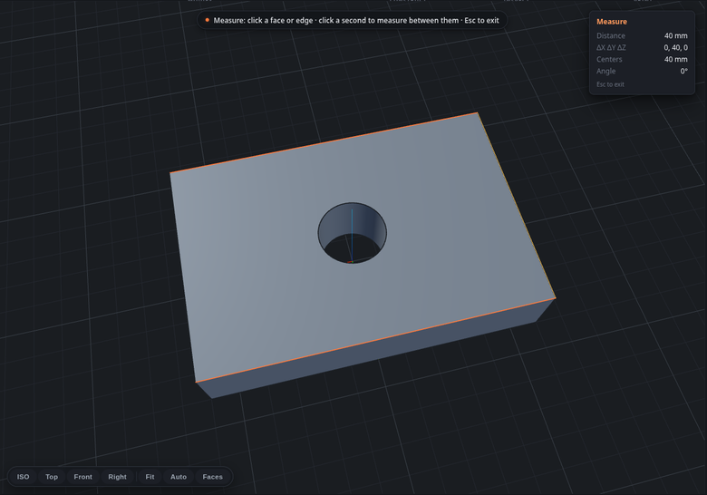 Measuring between two edges of a plate: the readout shows distance, axis deltas, centre distance and angle