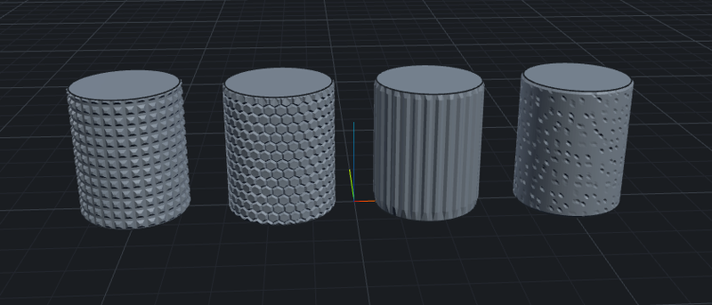Four cylinders with knurl, hexagon, rib, and Voronoi textures side by side