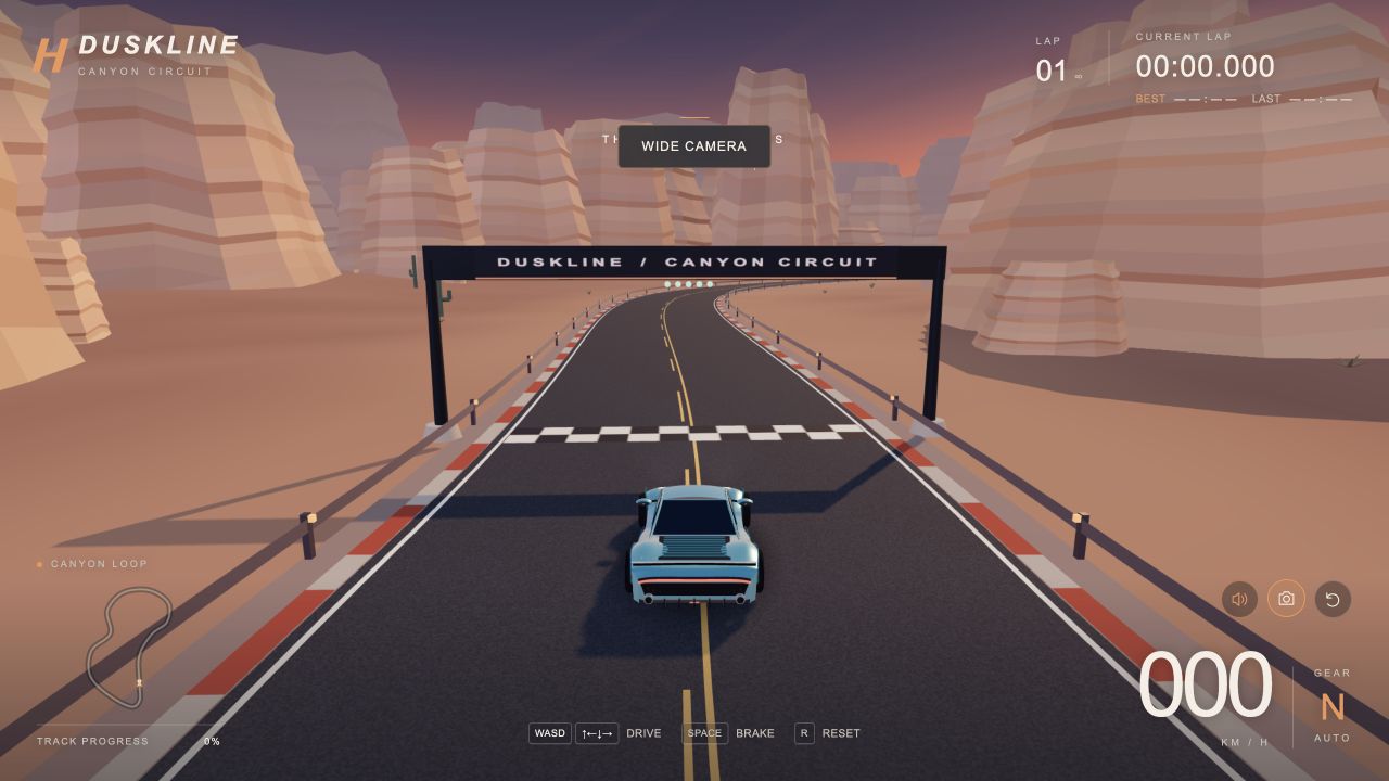 Car at the canyon start line in wide camera, with lap and minimap HUD.