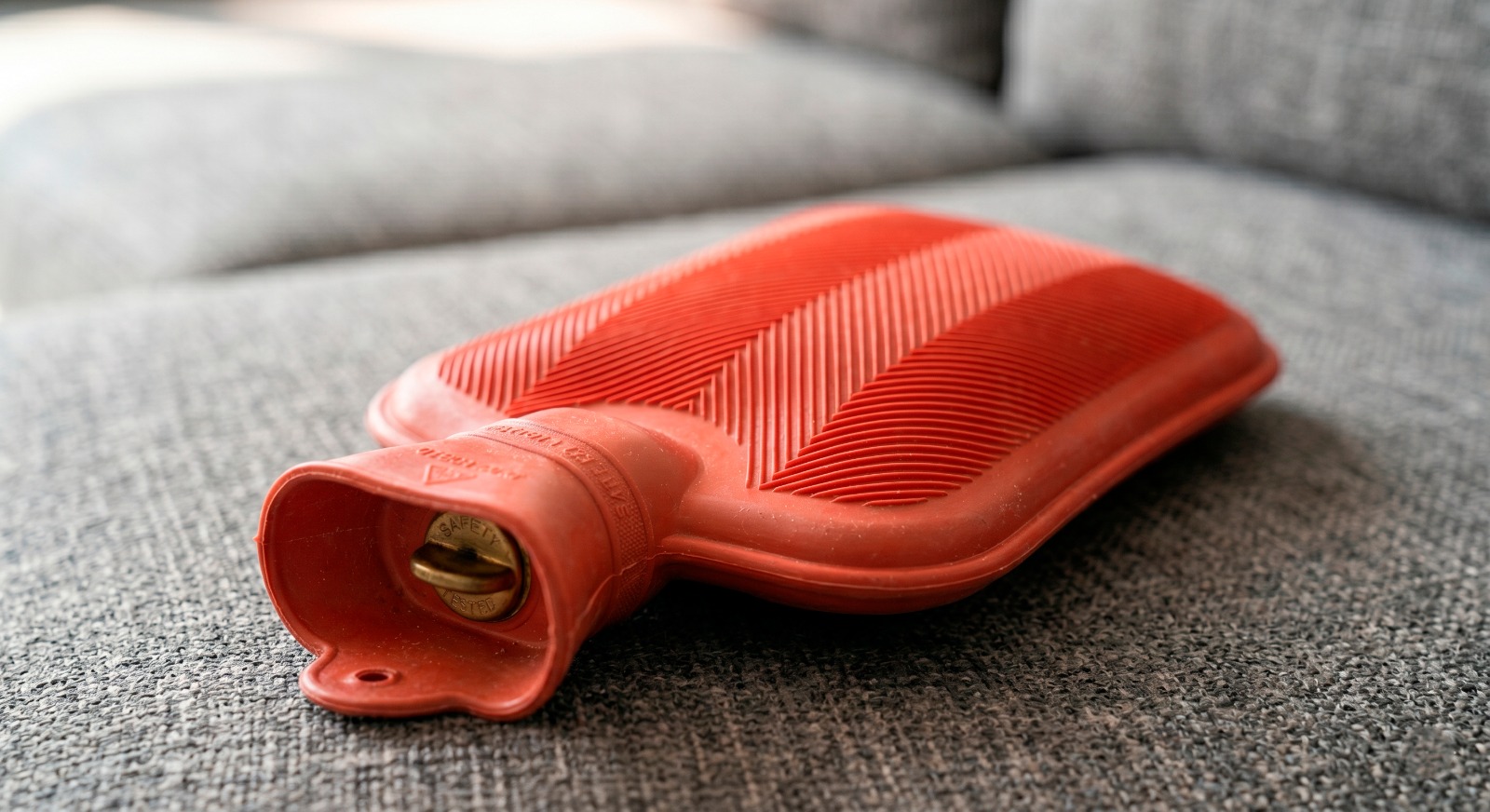 A hot water bottle for warmth therapy